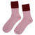 Luxuriously soft Chalet Socks crafted from 85% Australian merino wool, 12% polyester, and 3% spandex. These premium socks feature natural moisture-wicking and temperature-regulating properties, keeping your feet comfortable year-round. The thick, velvety construction pairs with a refined finish and striking berry and garnet colour-blocking for a sophisticated everyday essential. Breathable merino wool adapts to any season warm when temperatures drop, cool when they rise.