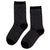 Unified Glitter Socks in Black Disco deliver everyday sparkle with serious style. Crafted from a soft blend of nylon, cotton, and spandex, these socks transition seamlessly from sleek and polished under boots to relaxed and scrunched with sneakers. The subtle glitter catches light without overwhelming, making them perfect for adding unexpected shine to any look—whether you're heading to a party or just want to elevate your everyday wear. 