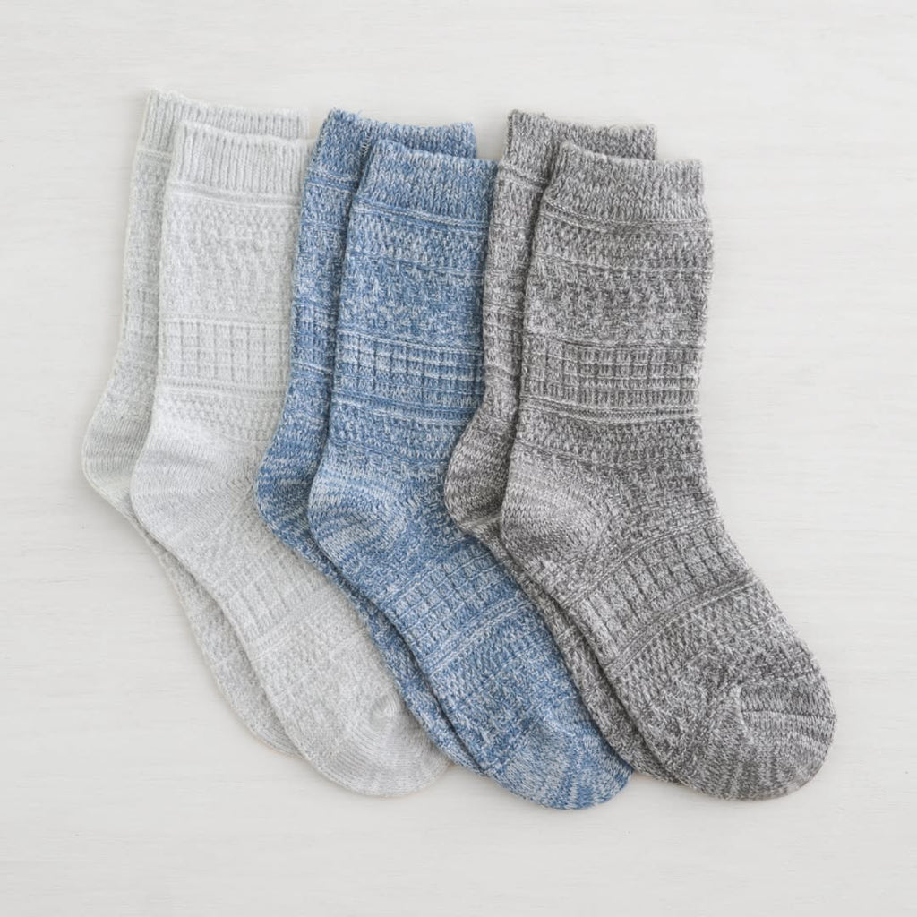 Step up your sock game with Lemon Cabin Crew Socks in blue-grey. Crafted from a premium blend of 98% polyester and 2% spandex, these non-terry crew socks offer the perfect balance of breathability and stretch. Designed for all-day comfort, they work seamlessly whether you're at the office, on the go, or unwinding at home. The durable construction resists fading and maintains its shape wash after wash, giving you reliable performance that lasts. Simple, stylish, and built to keep up with your lifestyle.