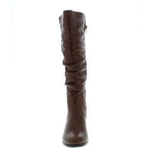 The Taxi Boston Waterproof knee-high boot offers reliable traction in rain or snow with its durable rubber outsole and cozy faux fur lining. The inside zipper ensures quick and easy on and off, making it a perfect choice for any cold-weather wardrobe.