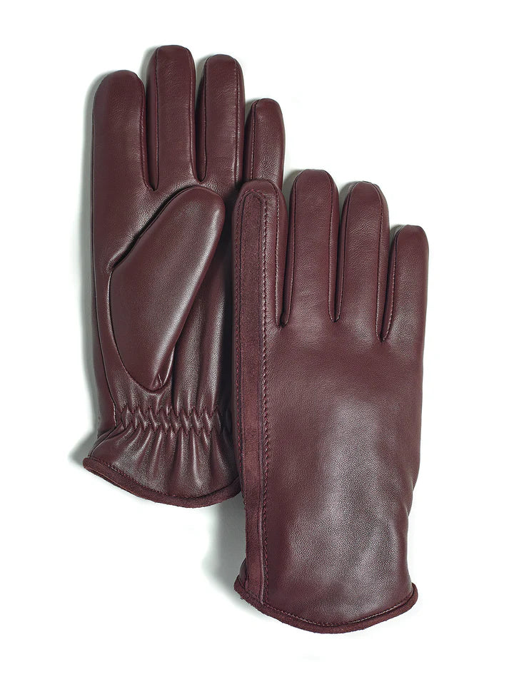 The Brume Halifax Glove offers a vintage kidskin exterior and a soft micro-terry polyester lining. Stay warm and comfortable with plush mitt lining and HEAT-mX thermal insulation. This glove is moisture-wicking, breathable, and resistant to water and wind. The elasticized wrist allows for a secure fit.