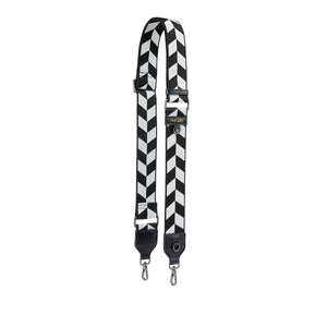 Looking to give your bag a personal touch? The Pixie Mood Carly Strap in Black Chevron will elevate your style with its wide woven design. Make a statement and turn heads with this customizable strap.