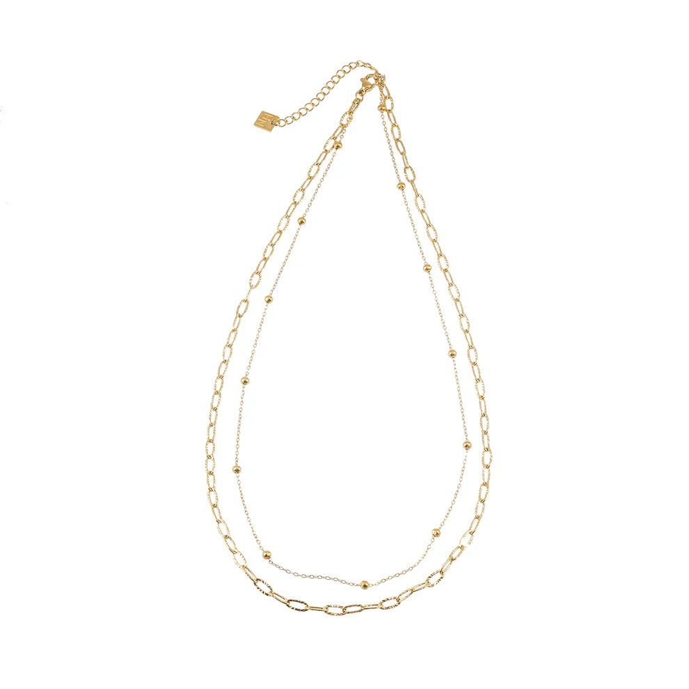 Elevate your style with the Hackney Nine Castilia necklace.  Featuring two unique chains. The textured paper clip chain and beaded chain layer together to effortlessly enhance any outfit.