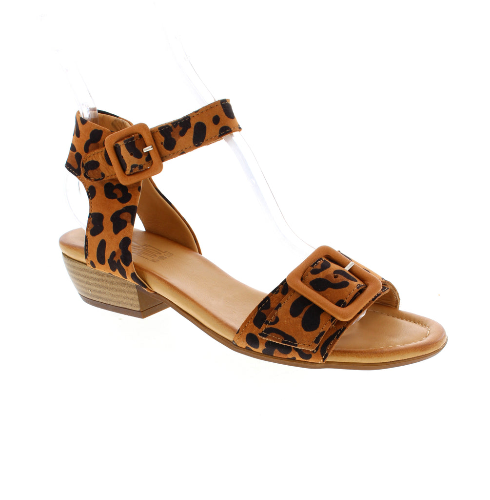 Step into style with the Miz Mooz Chessie sandal in eye-catching leopard print. Featuring a comfortable block heel under 1 inch, dual closure options with halter strap and buckle, and premium leather construction throughout.