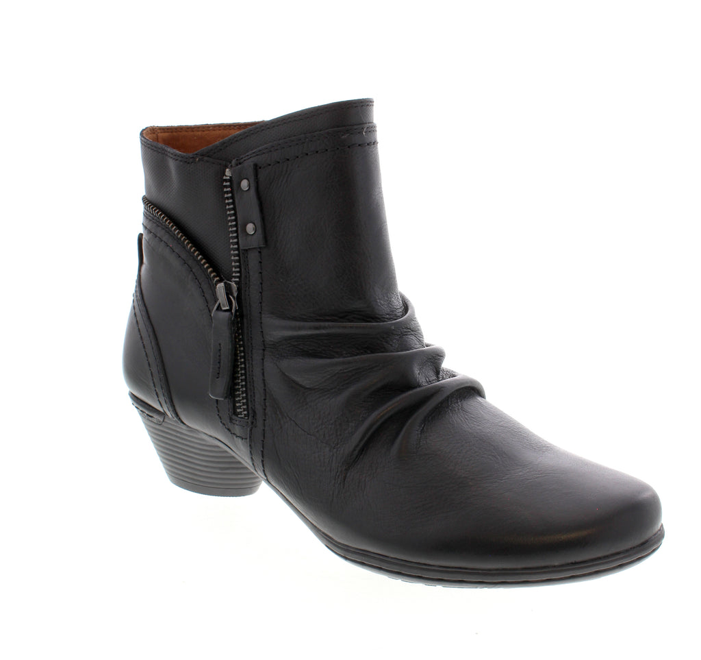 The Cobb Hill Laurel Boot will ensure you look chic and sophisticated in any situation. Featuring an elegant cone heel for added lift, a molded microfiber footbed and TPR outsole for reliable support and shock absorption, and stylish full-grain antiqued leathers, ruching detailing and zippered accents promise to elevate any outfit.
