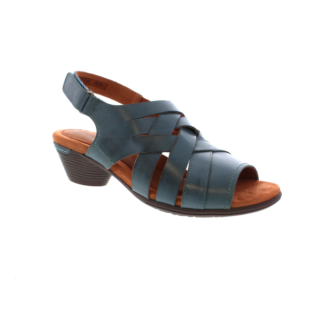 Experience exceptional comfort and style with the Cobb Hill CJ0928 heeled sandal. Crafted with a leather upper and a stacked heel, this shoe offers both durability and a refined look. Designed for all-day wear, this sandal features flexibility, built-in arch support, and an adjustable closure to ensure a perfect fit from the very first step. Ideal for those seeking both elegance and ergonomic support in their footwear.