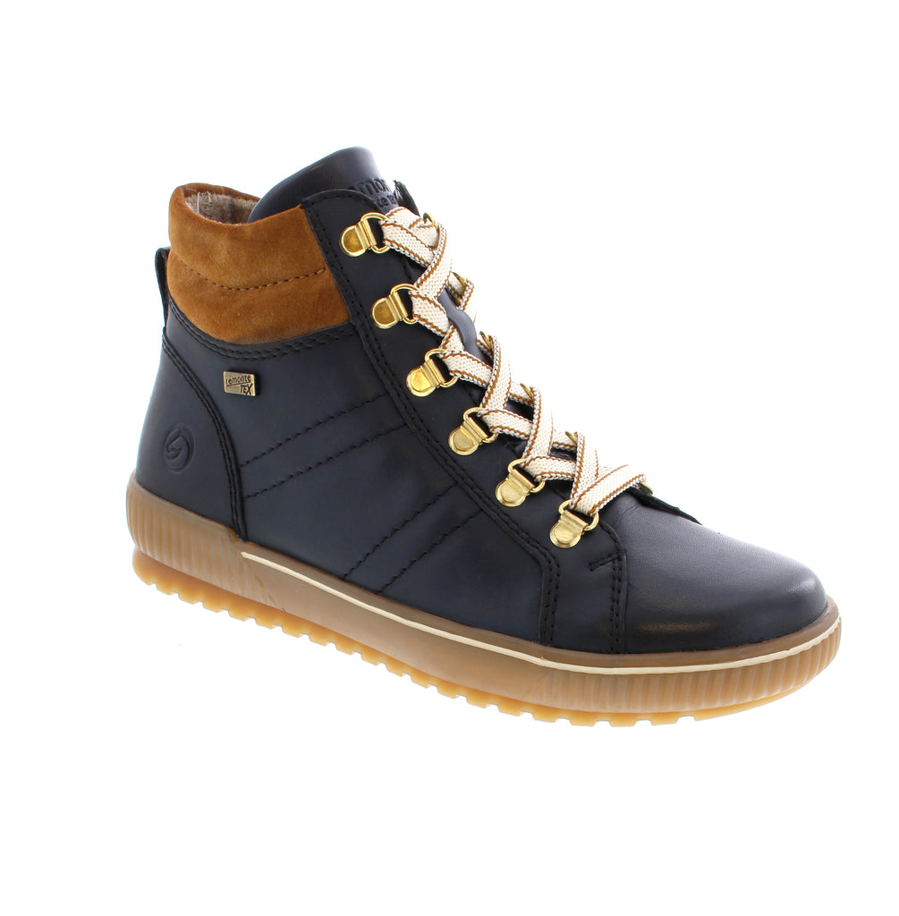 These Remonte D0781-14 lace-up boots combine style and comfort effortlessly. Crafted from smooth leather, they feature both laces and a zipper for easy wear, plus interchangeable laces for a personalized look. The padded, removable insole and flexible sole provide cushioning and stability on any surface. Designed with comfort width, they offer extra room for natural foot movement. Thanks to remonteTEX technology, these boots are water-repellent and wind-resistant