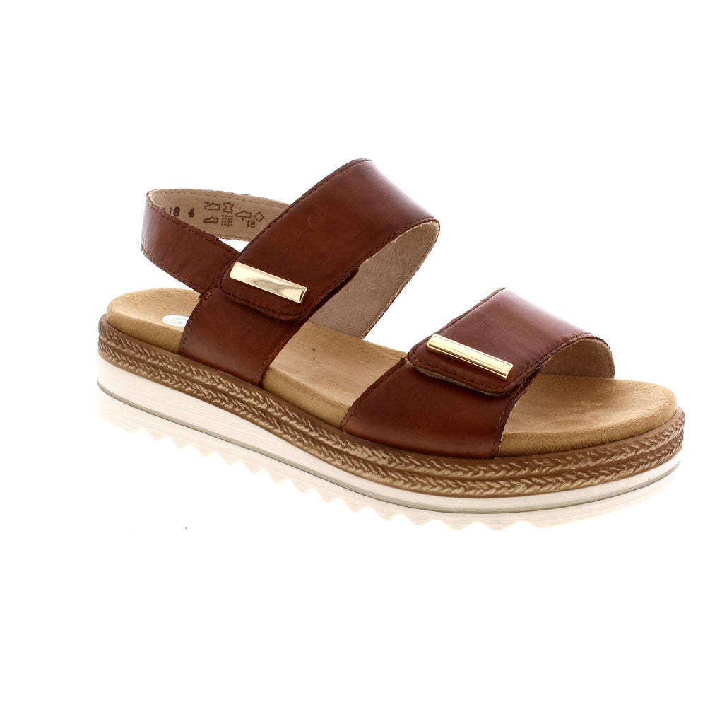 Expertly crafted with a leather upper and fixed soft leather insole, the Remonte D0Q59-24 is a comfortable and stylish choice. The elastic cross straps provide a snug fit, while the PU outsole offers durability. Ideal for any outfit, this sandal is a versatile addition to your wardrobe.