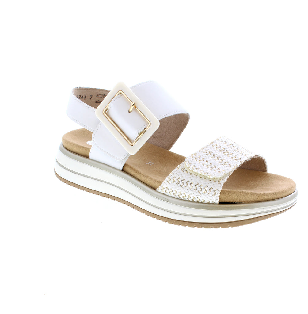 Meet your new go-to summer essential: the Remonte D1J53-81 sandal in crisp white. This casual beauty pairs a leather upper with a charming basket weave pattern for understated sophistication. The round toe silhouette and flatform heel keep things comfy and on-trend, while double closure options let you customize your fit. Inside, a removable microfiber insole and cushioning foam midsole work together for everyday comfort.