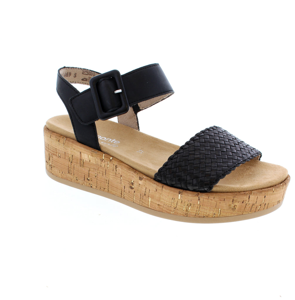 The Remonte D1N56-00 is a black sandal featuring a leather upper with basket weave detailing and round toe design. Its elasticized upper and velcro closures ensure a comfortable fit. The wedge heel, foam midsole, and removable microfiber insole deliver all-day comfort. Orthotic-friendly and true-to-size for narrow-to-medium feet.