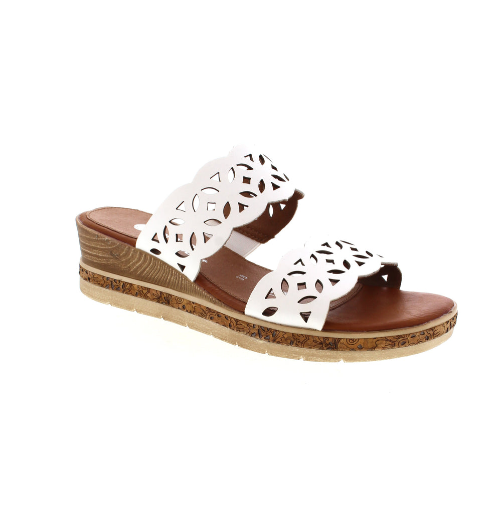 This beautiful slip-on wedge sandal features a leather perforated upper. Designed with a shock-absorbing footbed, your feet will look and feel their best!