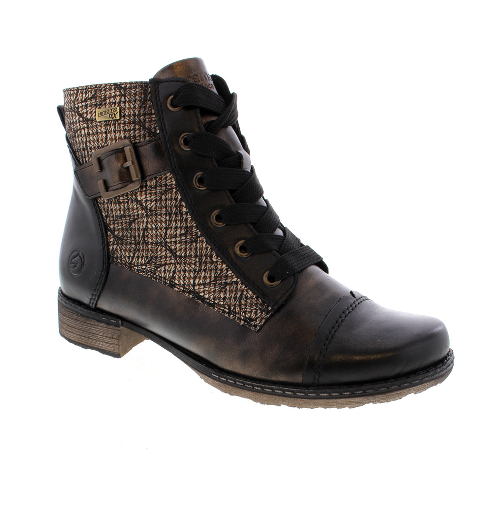 Remonte D4381-90 brings effortless elegance to your everyday rotation. This black ankle boot combines comfort with timeless style, perfect for casual outings and weekend adventures. Crafted with a leather upper and supportive foam midsole, the D4381-90 features a practical block heel and almond toe silhouette. The lace-up entry ensures a secure fit.