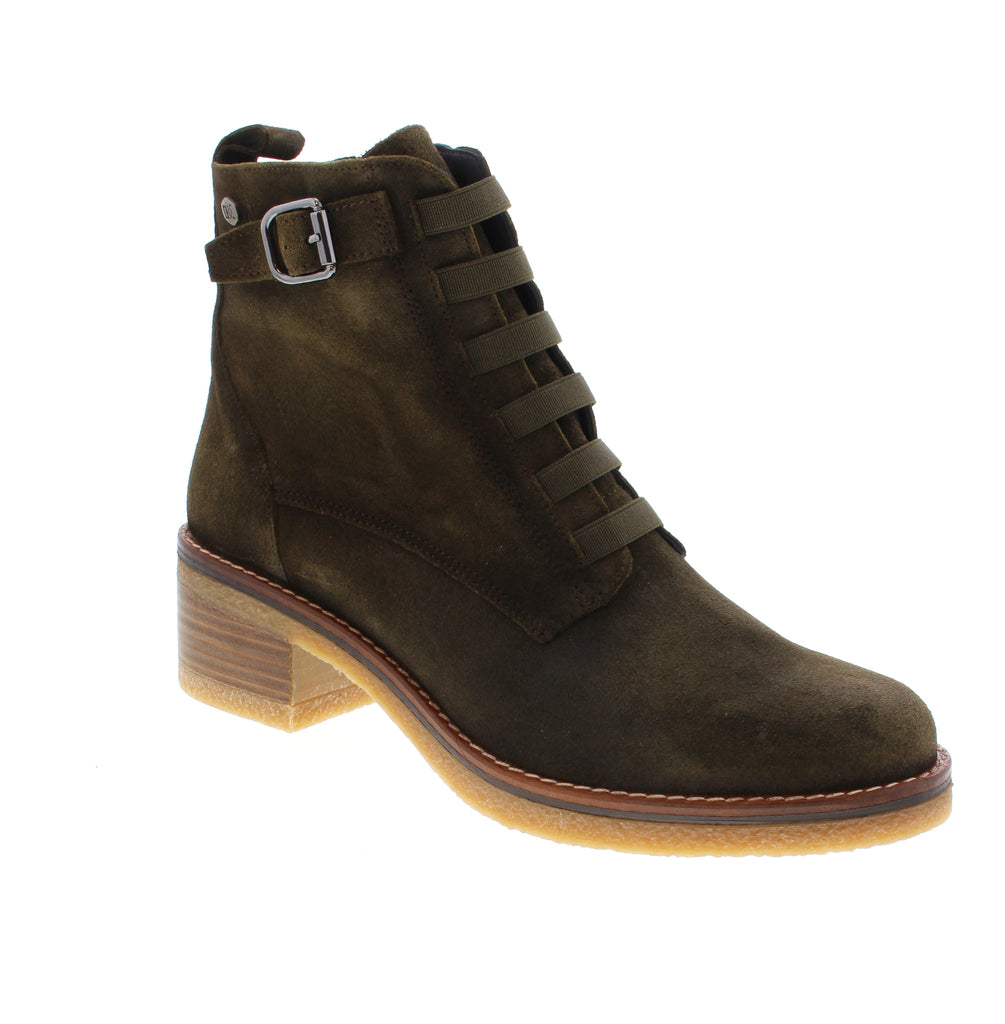 Elevate your everyday style with the Dorking Lucero D8868 in rich khaki. This sophisticated ankle bootie combines premium suede craftsmanship with practical comfort, featuring a supportive foam midsole and secure side zip entry for effortless wear.