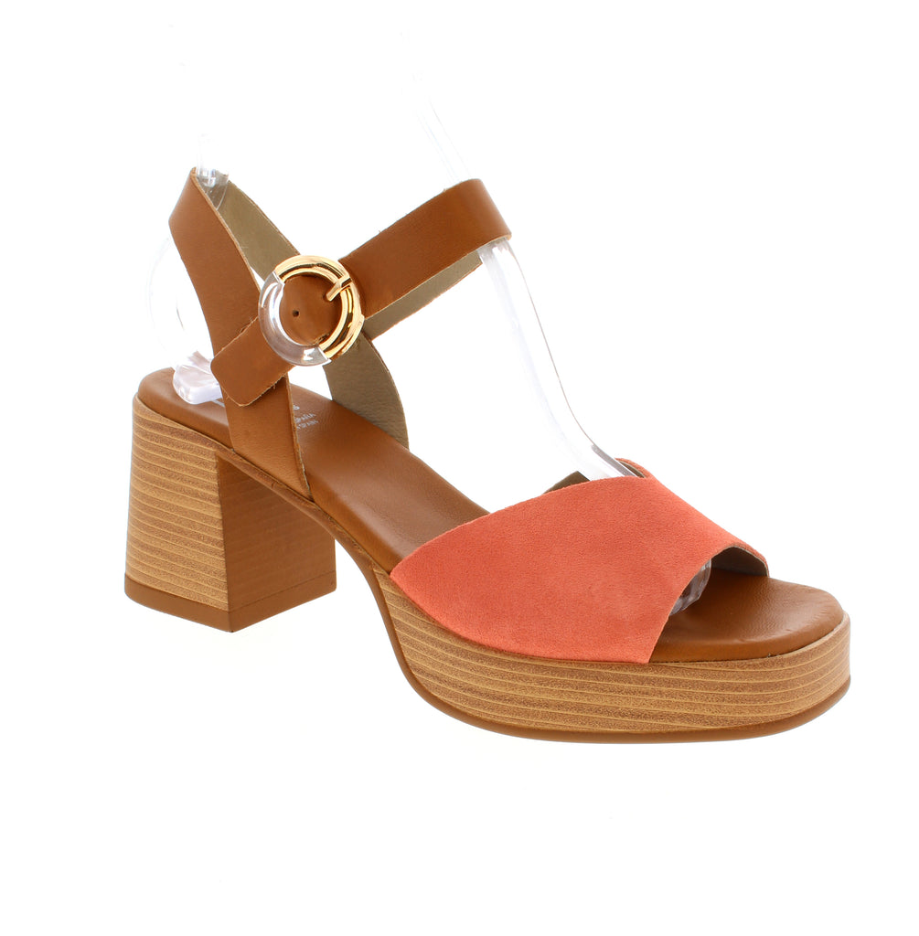 Blush your way through summer in the Dorking Diamond D9287, a charming pink slingback that's equal parts elegant and easy-going. Crafted from premium leather and suede, this sandal features a supportive block heel with platform base, keeping you comfortable whether you're heading to a casual brunch or a wedding celebration. The halter strap and buckle closure ensure a secure, customizable fit, while the round toe and foam midsole deliver cushioned all-day wear.