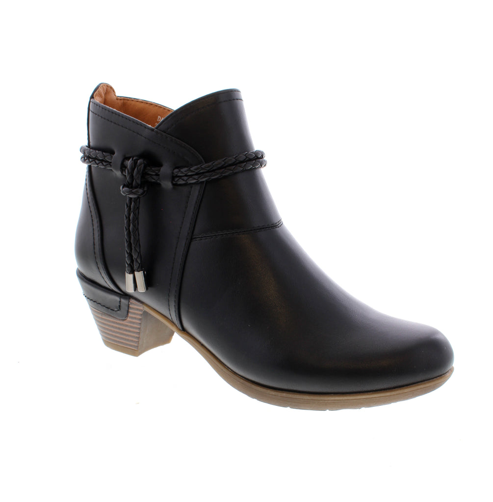 Elevate your everyday style with the Patrizia Dandre bootie in sleek black. This versatile ankle boot combines comfort and sophistication for any casual occasion. The side zip entry makes it effortless to slip on and off, while the foam midsole and cushioned footbed provide all-day comfort. Whether you're running errands or meeting friends, this timeless bootie transitions seamlessly from day to night.