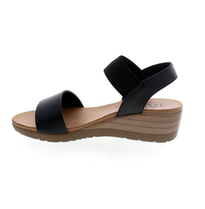 Take on the day and night in style with the Taxi Debbie-01 wedge sandal. From casual daytime looks to chic evening outfits, its versatile design effortlessly transitions with you. Dress it up or down for any occasion. Crafted for comfort and fashion-forward style, it's a must-have for your wardrobe.