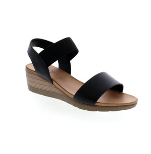 Take on the day and night in style with the Taxi Debbie-01 wedge sandal. From casual daytime looks to chic evening outfits, its versatile design effortlessly transitions with you. Dress it up or down for any occasion. Crafted for comfort and fashion-forward style, it's a must-have for your wardrobe.