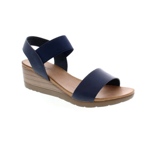 Take on the day and night in style with the Taxi Debbie-01 wedge sandal. From casual daytime looks to chic evening outfits, its versatile design effortlessly transitions with you. Dress it up or down for any occasion. Crafted for comfort and fashion-forward style, it's a must-have for your wardrobe.