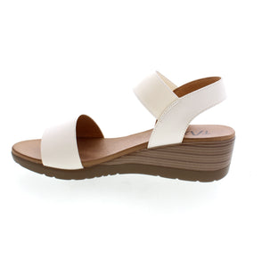 Take on the day and night in style with the Taxi Debbie-01 wedge sandal. From casual daytime looks to chic evening outfits, its versatile design effortlessly transitions with you. Dress it up or down for any occasion. Crafted for comfort and fashion-forward style, it's a must-have for your wardrobe.