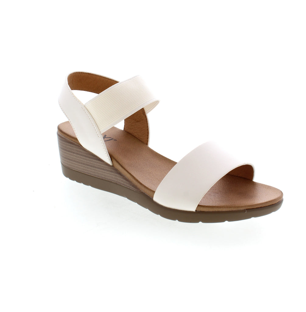 Take on the day and night in style with the Taxi Debbie-01 wedge sandal. From casual daytime looks to chic evening outfits, its versatile design effortlessly transitions with you. Dress it up or down for any occasion. Crafted for comfort and fashion-forward style, it's a must-have for your wardrobe.