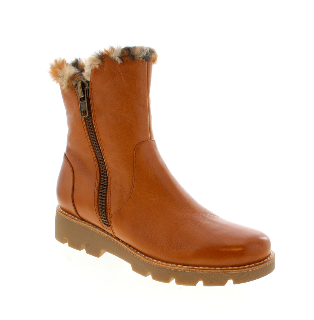 Step into style with the Django &amp; Juliet Dlinga-DJ in Tan Leopard. This chic ankle boot combines a luxe leather upper with a cozy faux fur collar and lining for a look that's equal parts sophisticated and playful. Designed for everyday wear, the Dlinga-DJ features a comfortable foam midsole and rubber outsole for reliable traction. The double-side zip entry makes getting in and out effortless, while the platform heel and round toe keep things modern and wearable.&nbsp;