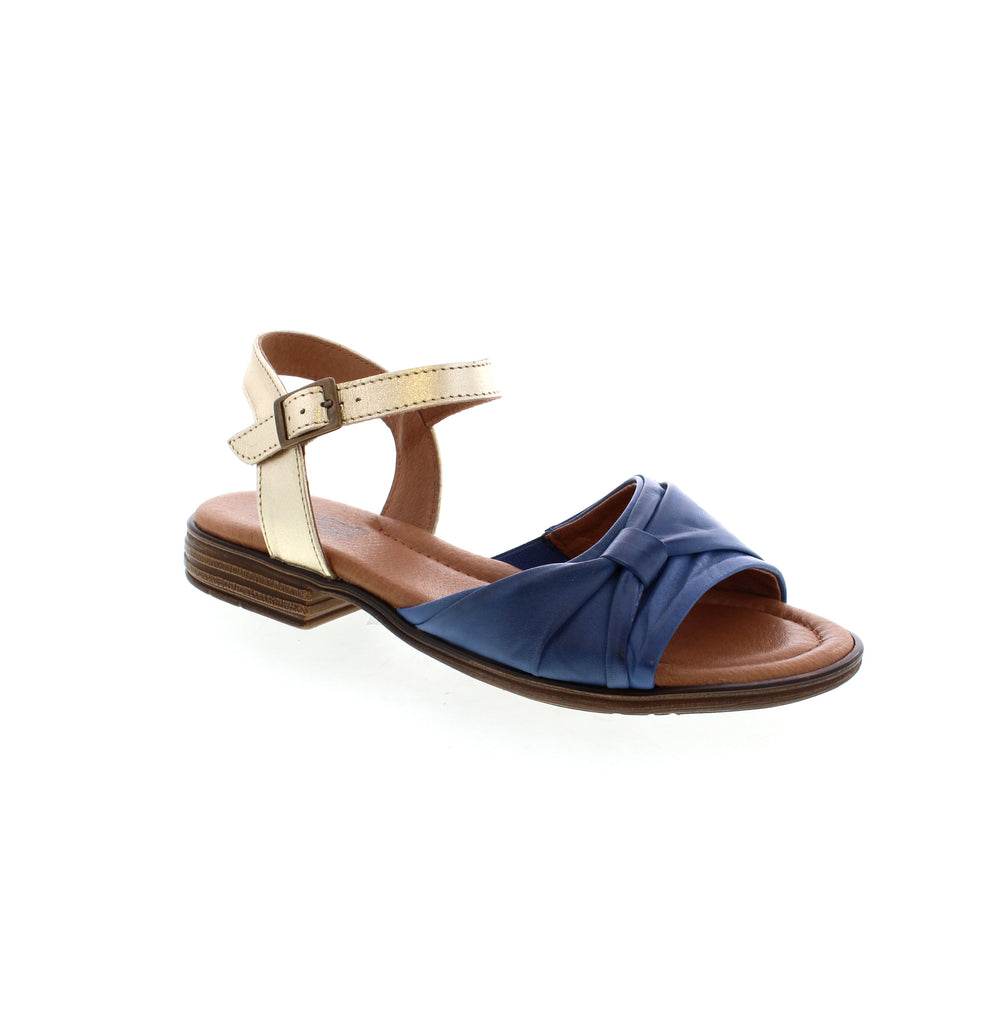 The Miz Mooz Dorra sandal offers both style and comfort with its secure, adjustable strap, ruching detailing, and small heel. Made of high-quality leather with open-toe detailing, this sandal is perfect for any casual or dressed-up look.
