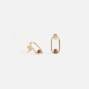 Look stylishly chic with the Elk Braque Drop Earring. This lightweight dangle features a bold bead, mounted to a shiny gold oval frame. Perfect as a single statement or paired with the Braque necklace for maximum impact.