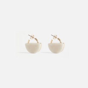 The Elk Kriis earring is a showstopper—a semi-circular stone set intricately in a gold frame. Perfect for day or night, this versatile style is sure to make heads turn with effortless style.