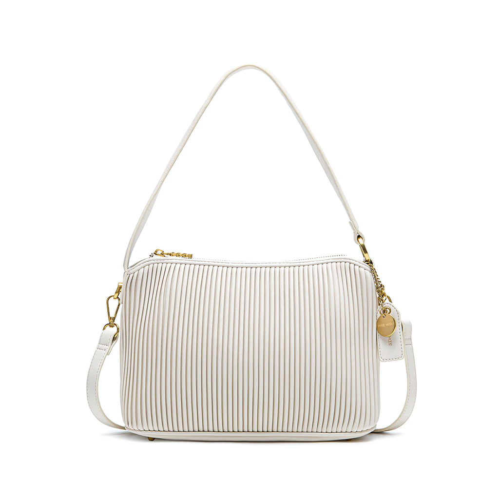 The Pixie Mood Ella is the ultimate must-have bag, featuring a luxurious pleated material for a sophisticated look. Whether you prefer it as a tote, crossbody, or shoulder bag, this versatile purse will add a touch of cute to any outfit. Get yours today and elevate your style game!