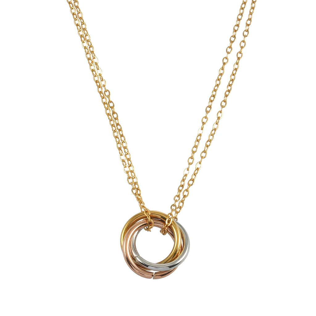 Embrace timeless elegance and meaningful symbolism with the Hackney Nine Elvira Double Chain Necklace featuring an Intertwined 3-Ring Pendant Charm. Delicate yet distinctive, this beautifully layered piece combines minimalist sophistication with a deeper sense of connection. The intertwined three-ring charm symbolizes unity and lasting bonds, making this necklace a meaningful addition to any jewelry collection.