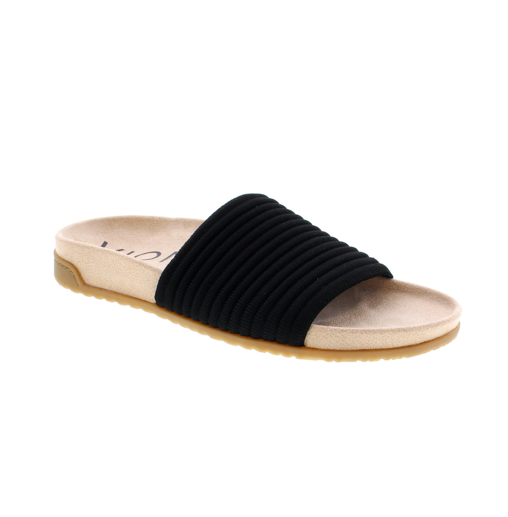 The Vionic Evie Knit Slide offers both style and comfort with its compression knit band and soft microfiber footbed. Perfect for casual days or all-day outings. You'll love the built-in Vio Motion Technology footbed featuring contoured arch support, with shock-absorbing cushioning.