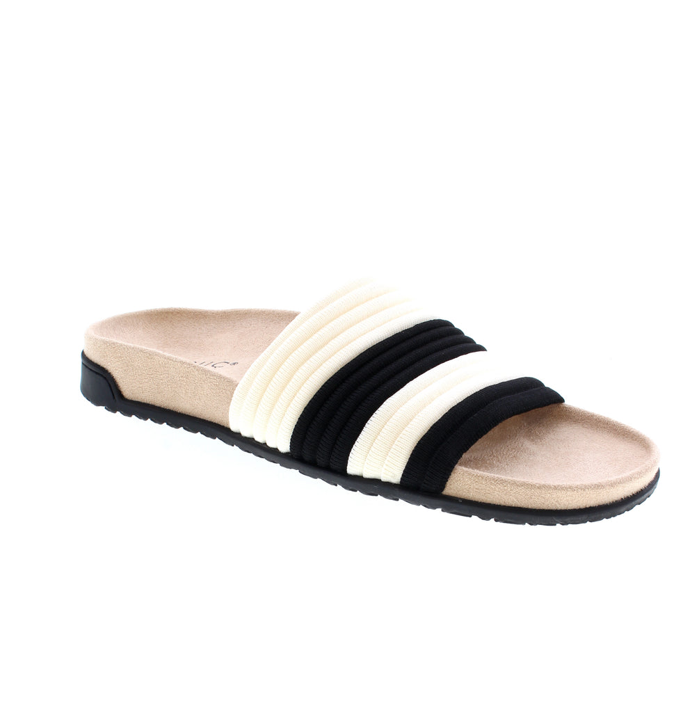 The Vionic Evie Knit Slide offers both style and comfort with its compression knit band and soft microfiber footbed. Perfect for casual days or all-day outings. You'll love the built-in Vio Motion Technology footbed featuring contoured arch support, with shock-absorbing cushioning.