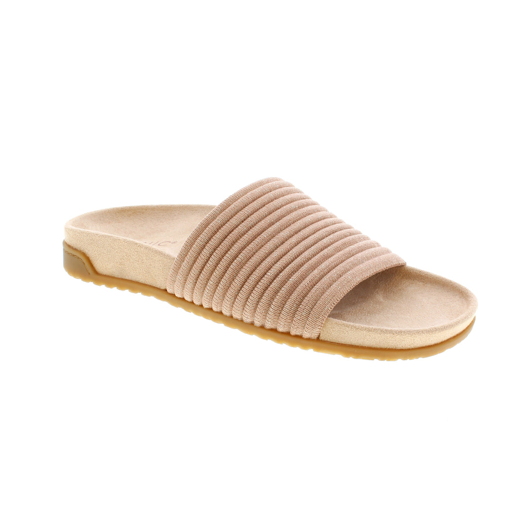 The Vionic Evie Knit Slide offers both style and comfort with its compression knit band and soft microfiber footbed. Perfect for casual days or all-day outings. You'll love the built-in Vio Motion Technology footbed featuring contoured arch support, with shock-absorbing cushioning.