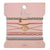 The K'lani Explore set features five versatile bracelets that also serve as hair ties, crafted in a harmonious mix of tan, pink, gray, and green tones. Each piece is accented with a gold compass charm, symbolizing a spirit of adventure and encouraging wearers to embrace exploration in their daily lives. Designed for both style and function, these accessories seamlessly blend practicality with meaningful design.