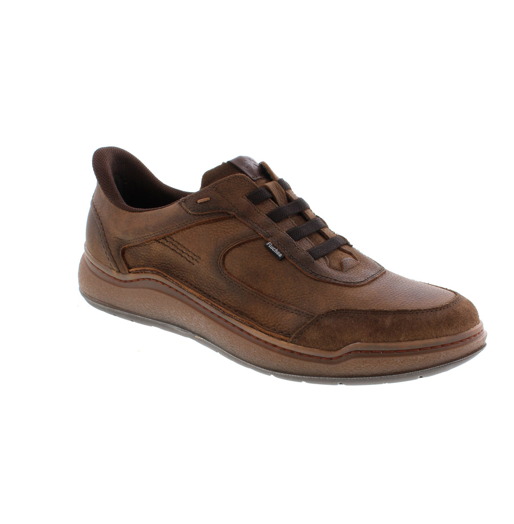 Fluchos Rocky F2253 brings Spanish craftsmanship to everyday comfort with a versatile slip-on design. Perfect for casual outings and athleisure moments, this brown leather sneaker combines style with practical wearability.