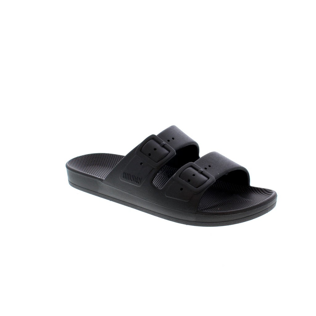 Freedom Moses black vegan slides are injected with air, so you feel like you're walking on a cloud. No matter where you're headed, these slides are waterproof and comfortable for all-day wear.
