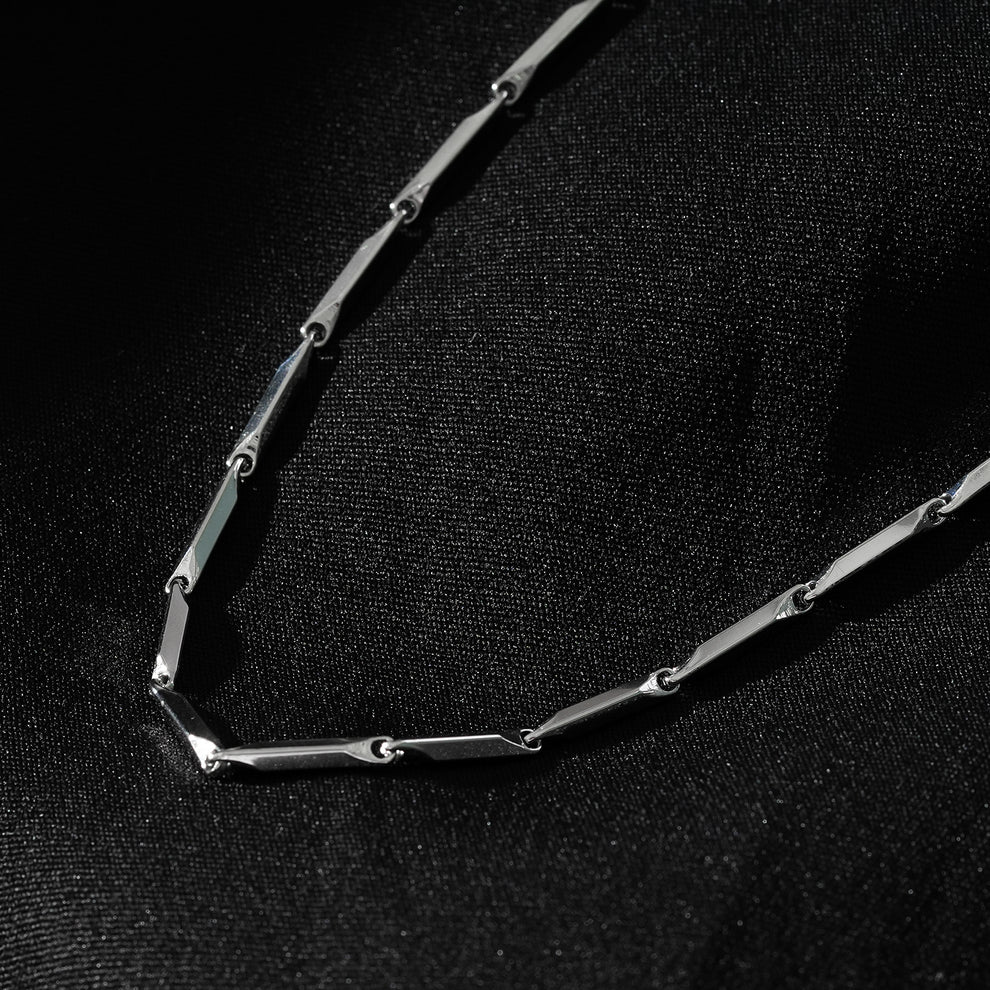 This sleek geometric beaded chain necklace combines minimalist design with luxurious materials. Crafted from premium alloy with 18-karat white gold plating, it delivers an elegant, versatile piece that complements any style. Perfect for everyday wear or special occasions.
