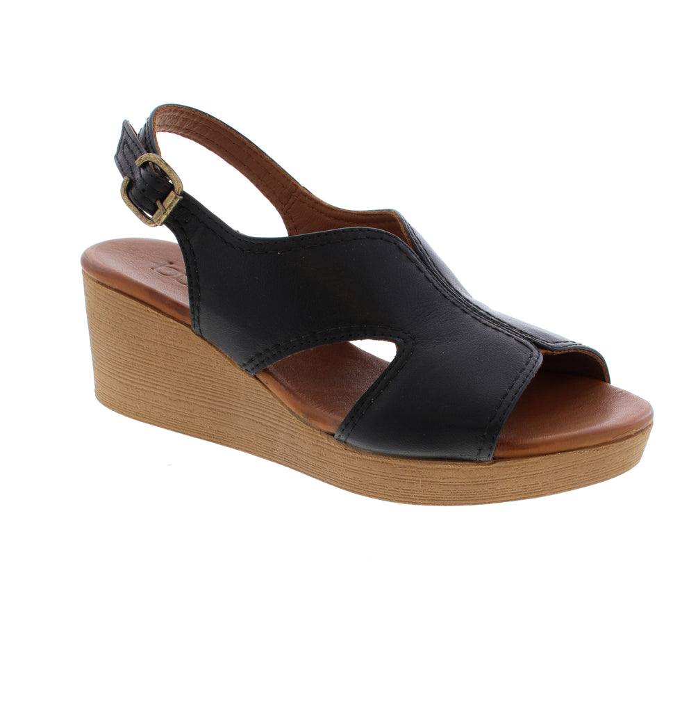 Step into effortless summer style with the Bueno Harriet sandal in sleek black. This European-sized slingback features a comfortable wedge heel (2-3") and open round toe design, perfect for casual outings. The leather upper and footbed provide durability and breathability, while the foam midsole cushions every step. With a secure buckle closure, the Harriet delivers both comfort and sophistication. The metallic accents add just the right touch of shimmer to elevate your warm-weather wardrobe.