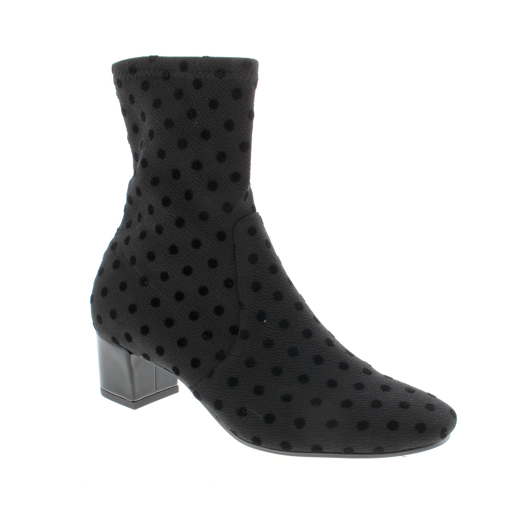 Django &amp; Juliet's Hartful-DJ ankle boot combines versatile style with everyday comfort. This black dot fabric boot features a supportive block heel and square toe, making it perfect for casual outings, office settings, or dressier occasions. Fabric upper with fabric lining and a cushioned foam midsole keep your feet comfortable throughout the day.