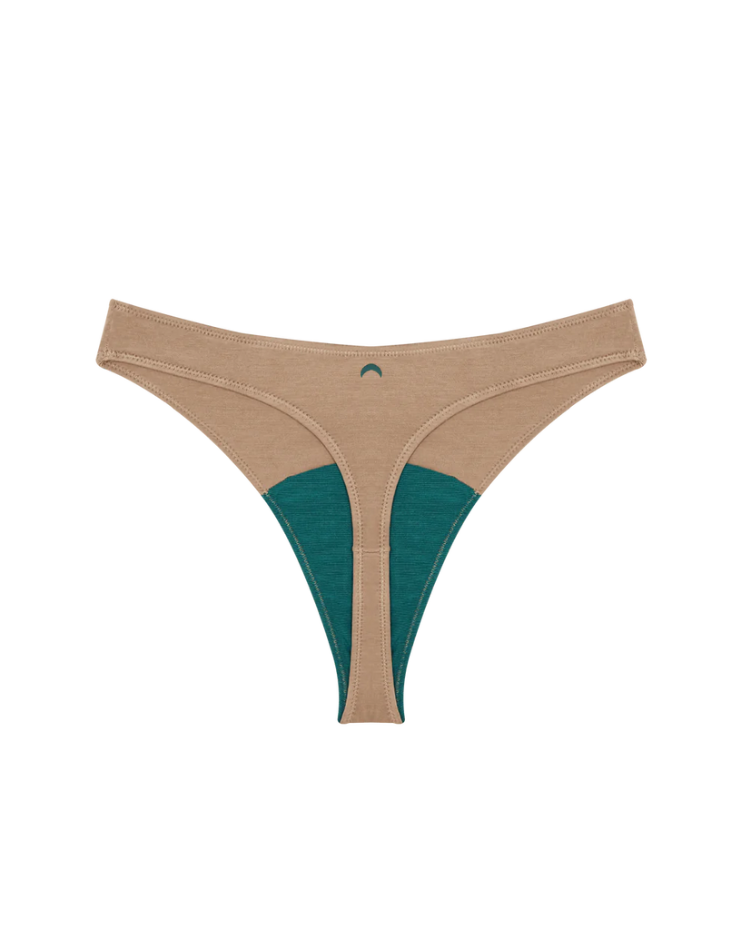 Introducing Huha's Mineral Undies High Rise Thong; a comfortable, high-rise thong with smartcel™ sensitive fibers reinforced with zinc oxide to keep you fresher, longer. Seam-free lining extends from the pubic area to the tailbone for full coverage, giving you confidence to move through your day.