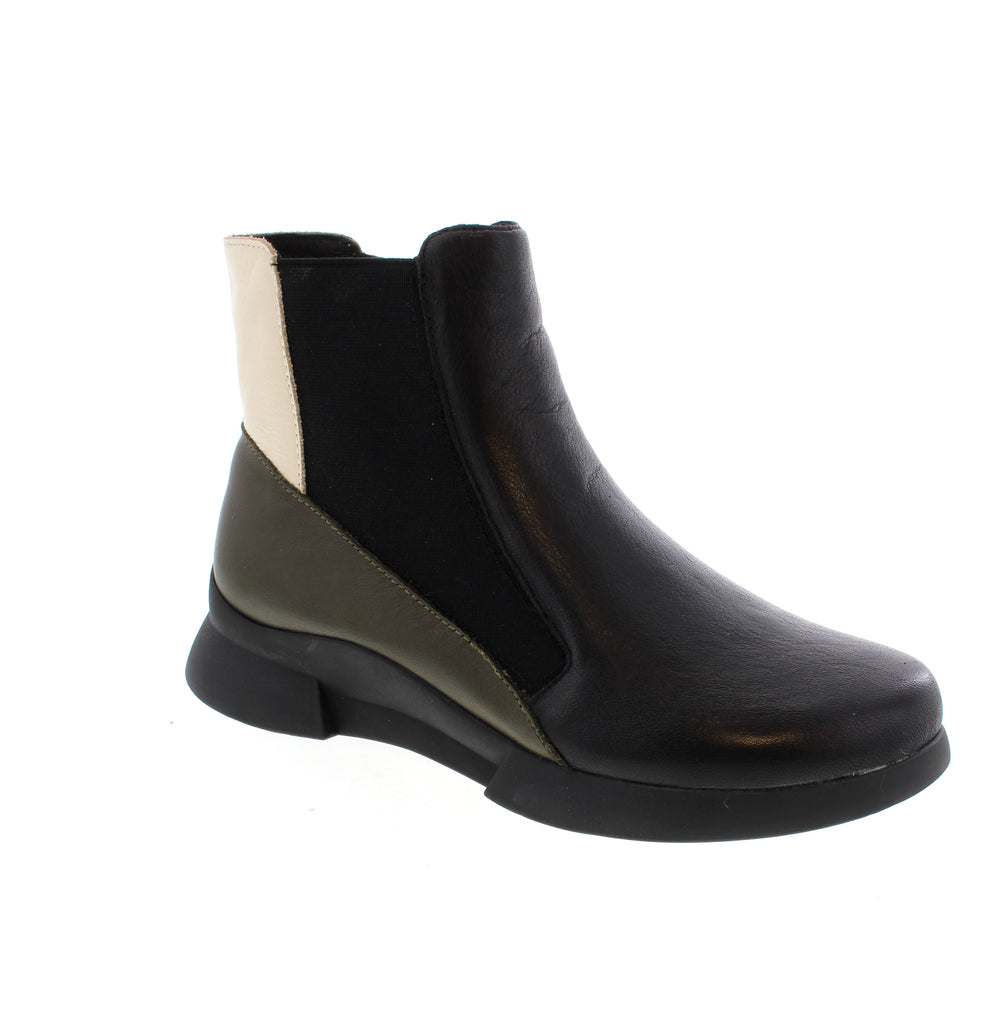 Step into effortless style with the Roamers Holly, a versatile ankle boot designed for everyday comfort. Featuring a leather upper with elasticized detailing, microfiber lining, and a supportive foam midsole, this boot delivers both durability and cushioning. The flatform sole provides a subtle lift while maintaining stability, making it perfect for casual outings. With a round toe silhouette and true-to-size fit, the Holly adapts seamlessly to your wardrobe.