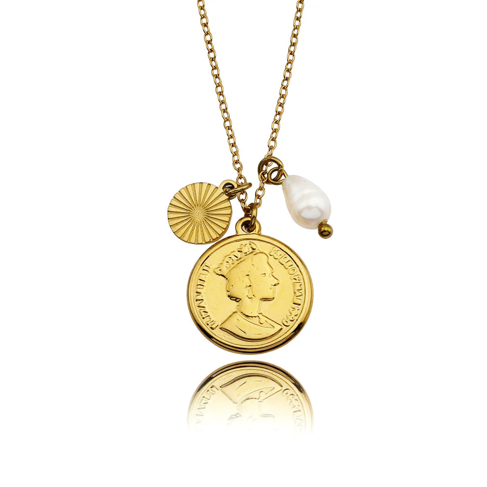 Portraying an old heirloom-found-object aesthetic, this dainty chain holds three adorable charms: an old British coin, a solitary fresh-water natural pearl and an art deco disc.

Crafted from Hand Forged Graded Metal Layered in Pure 18 Karat Gold. Free of Nickel, Lead and Cadmium. Non-Allergic and will not turn Skin Green.