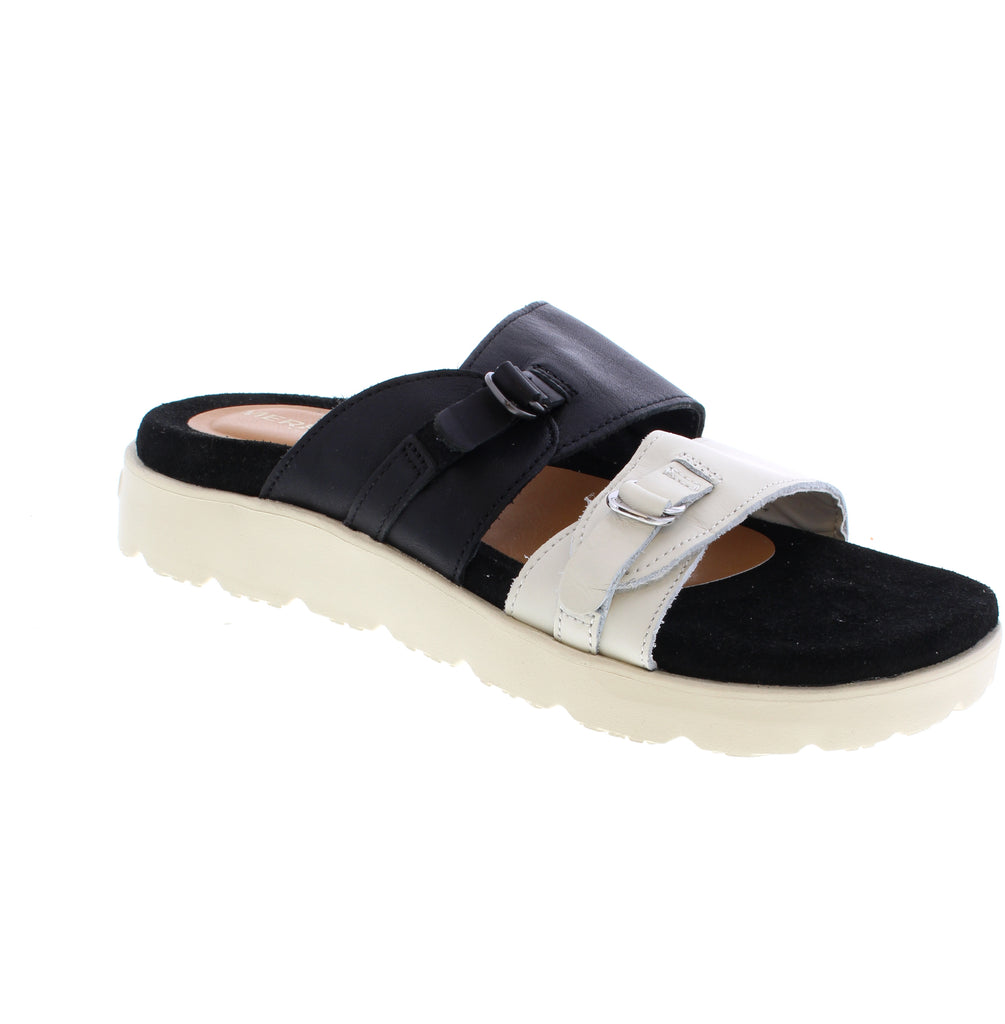 The Merrell Fleur LTR J00003325 Slide offers effortless comfort for warm-weather days. This buckle-closure slide features a leather upper with man-made leather lining and a plush suede footbed that molds to your foot. Light arch support keeps you comfortable during casual wear, while the rubber outsole provides reliable grip. The flatform heel design adds subtle lift without sacrificing stability.
