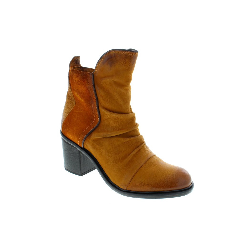 The Miz Mooz Jackey ankle boots are the perfect blend of style and comfort. The buttery soft leather and suede upper is complemented by ruching detailing and a unique cut. Cushioned insoles and rubber soles provide all-day comfort with an effortless fit. A must-have for any fashion-forward wardrobe.