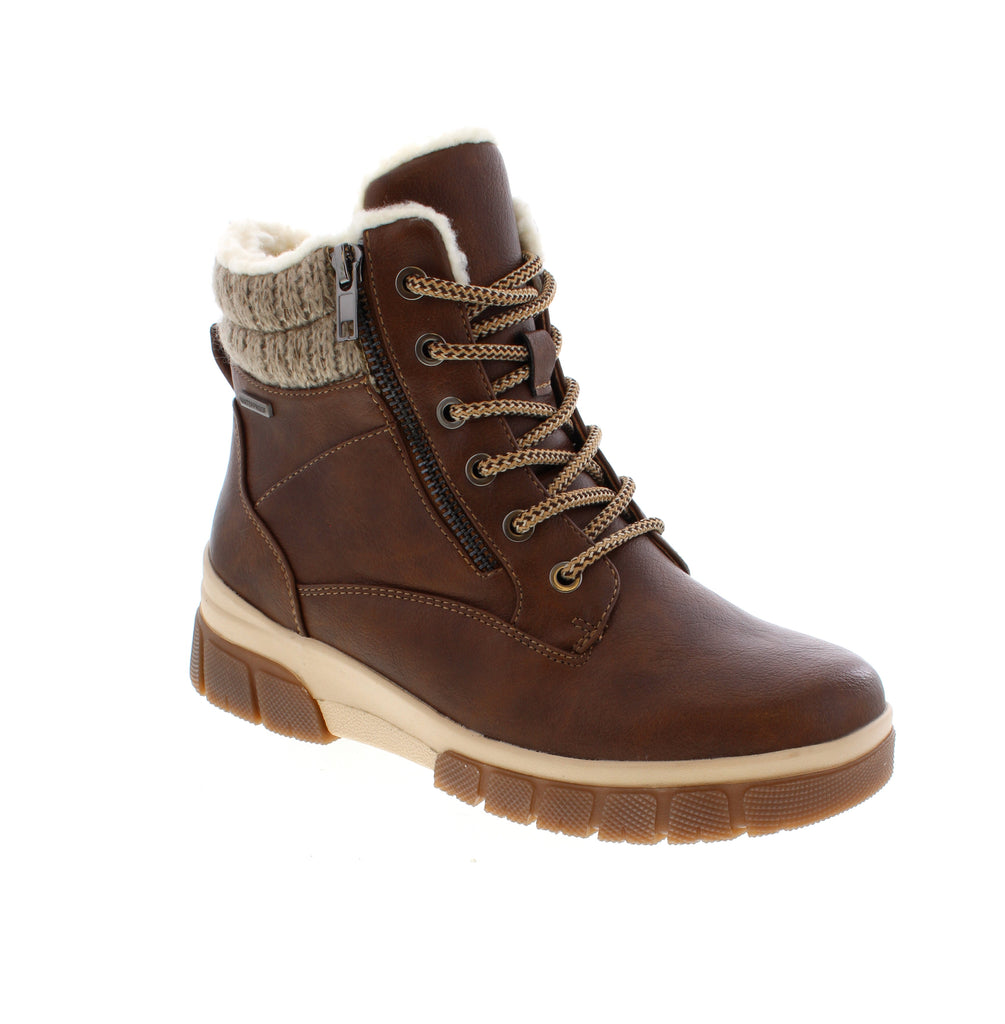 The Taxi Jada-01WP is a waterproof ankle boot designed for winter comfort and casual style. Featuring a man-made leather upper with fleece lining and insulation, this boot keeps your feet warm and dry in cold weather