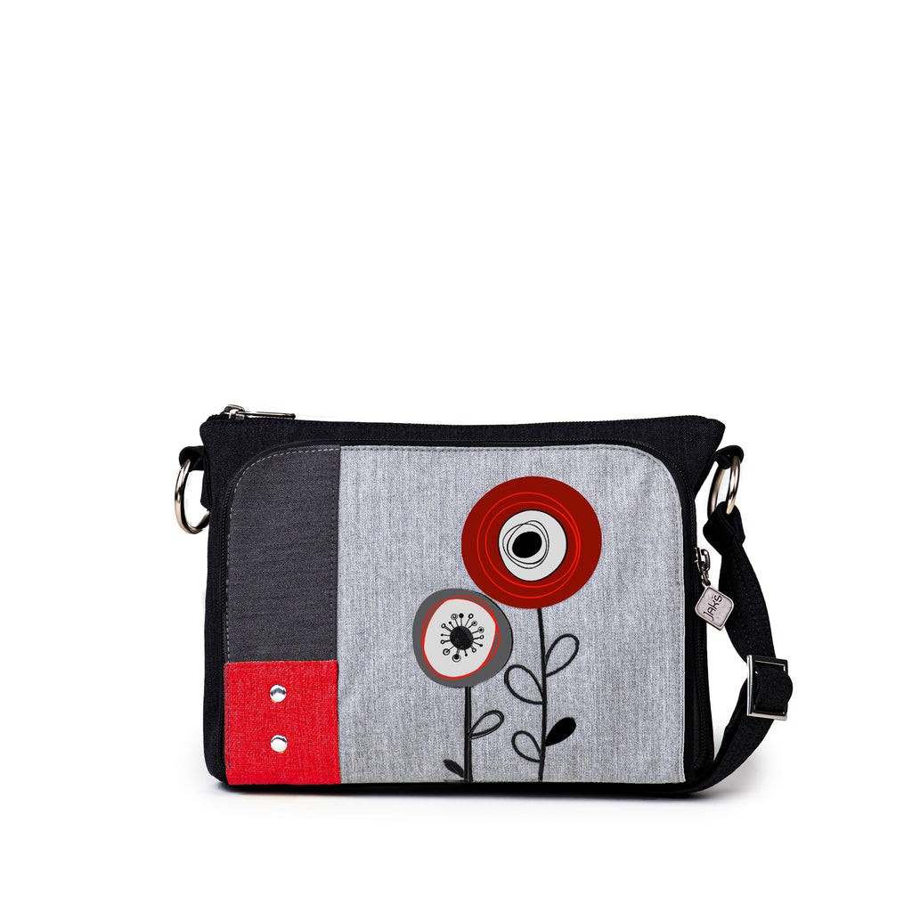 The Jak's Capri Classique cross body bag features a top zip main compartment and a front zip-around organizer for storing cards, cash and your phone.The embroidered detailing adds style to keeping your essentials organized.