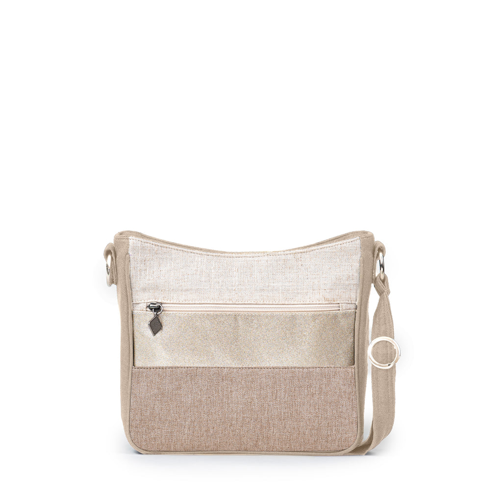 The Jak's Classique Fidji bag features a top zip main compartment and front zip pocket that is great for your phone. The back zip-around organizer stores cards and cash. This stylish bag is perfect for everyday use