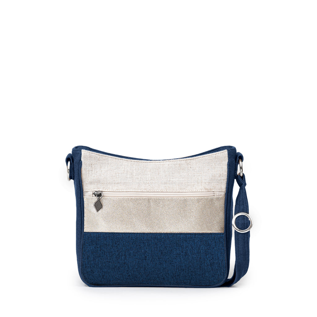 The Jak's Classique Fidji bag features a top zip main compartment and front zip pocket that is great for your phone. The back zip-around organizer stores cards and cash. This stylish bag is perfect for everyday use.