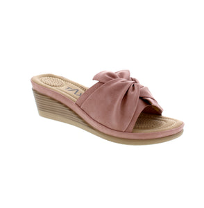 Experience comfort and style with the Janice-05 wedge Sandal. Featuring soft sock padding and a flexible outsole, these sandals are perfect for all-day wear. The beautiful tie detail adds a touch of fashion-forward design.