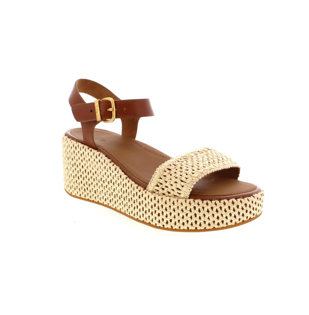 Indulge in the ultimate combination of style and comfort with a Fitflop Platforms Wedge. Crafted with soft neoprene-style fabric and a CushX™ midsole, these high heels offer a 90s vibe and superb cushioning.